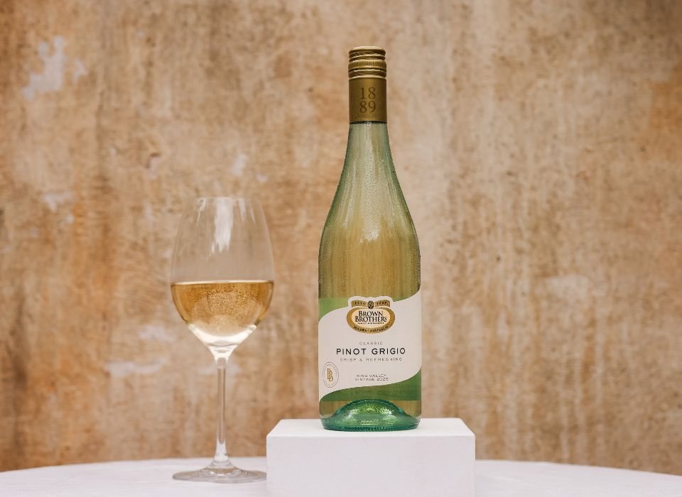 A bottle of Brown Brothers Pinot Grigio with a glass of wine