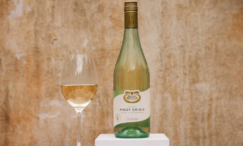 A bottle of Brown Brothers Pinot Grigio with a glass of wine