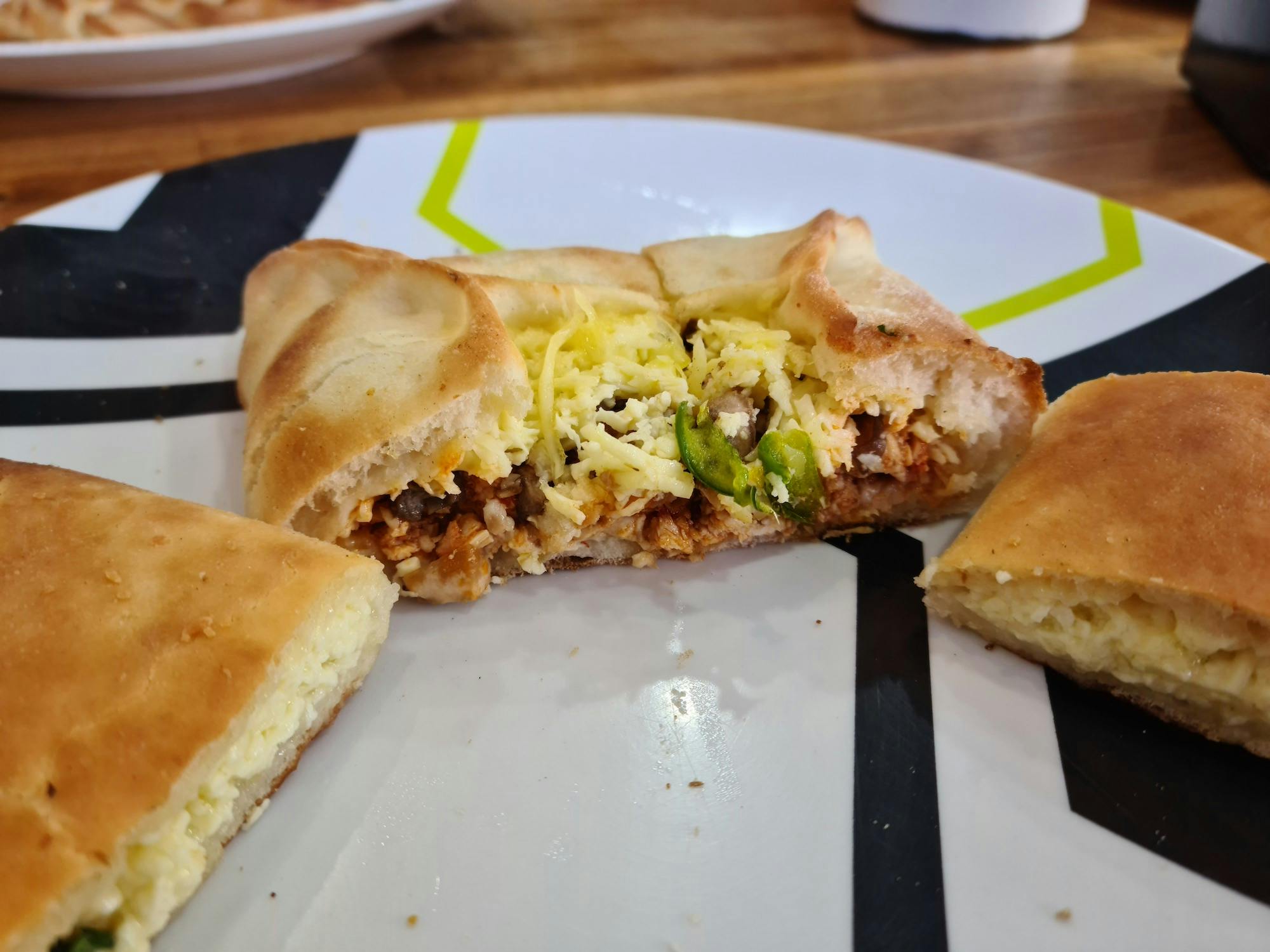 Sausage, vegetable and cheese pizza