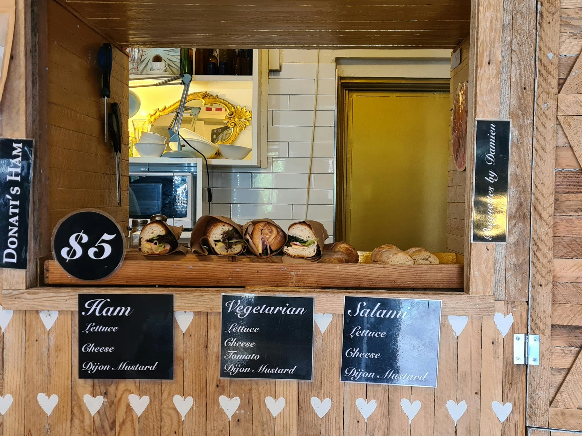 A pile of baguettes with three different types of fillings