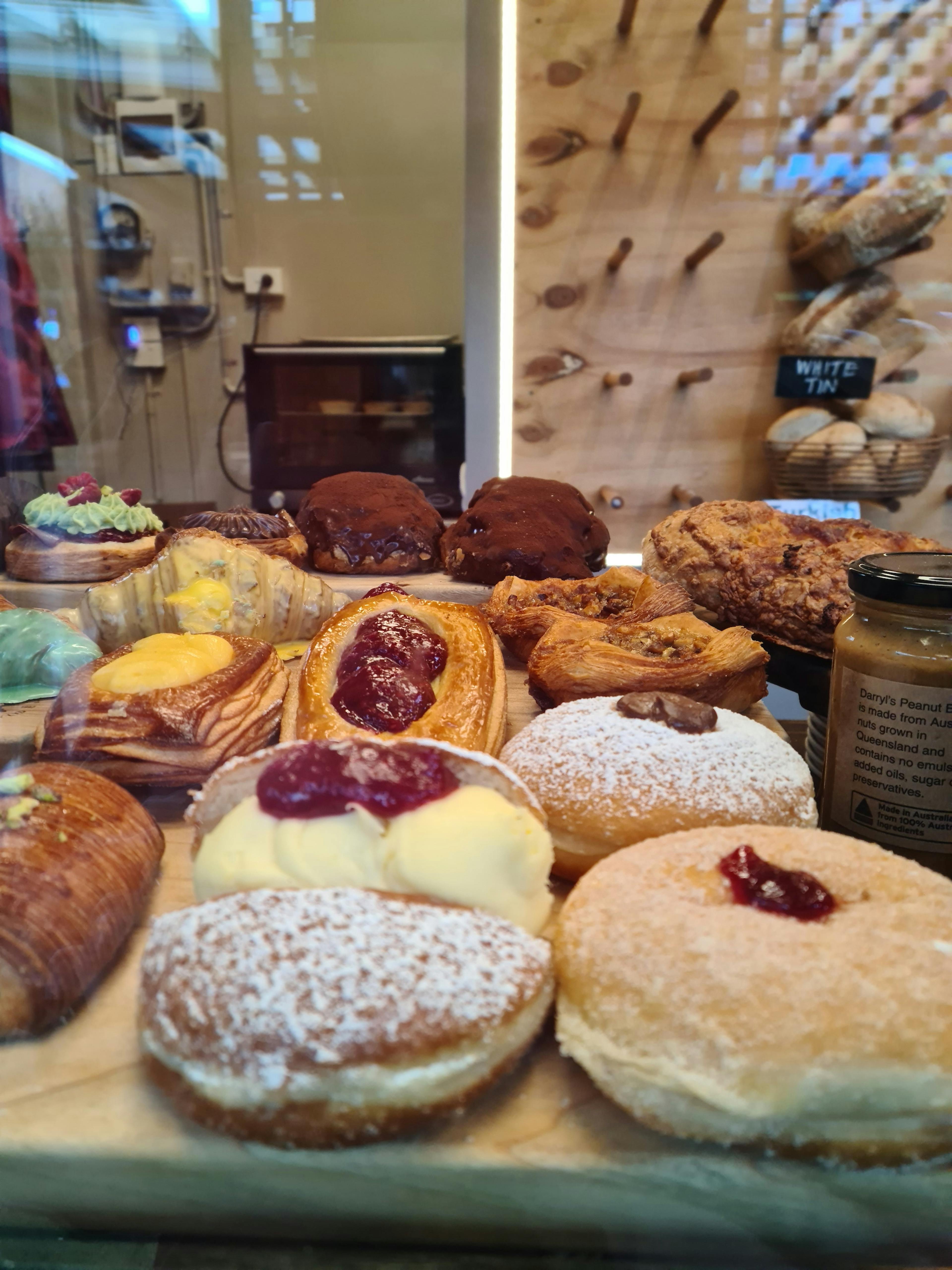 Jam filled donuts, danishes and croissants. 