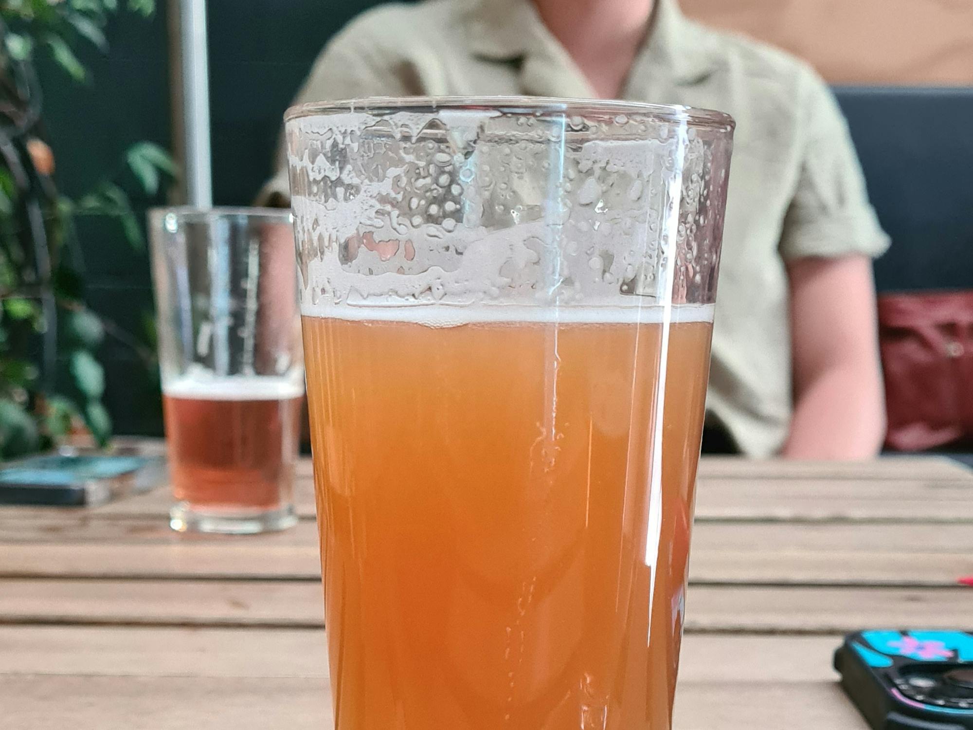 A close up of a pint of beer.
