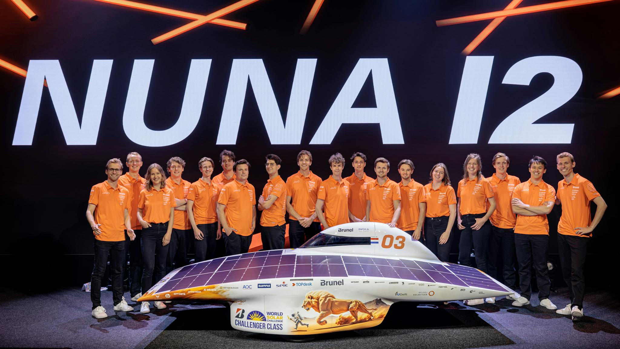 Nuna 12 on stage during the car reveal with team