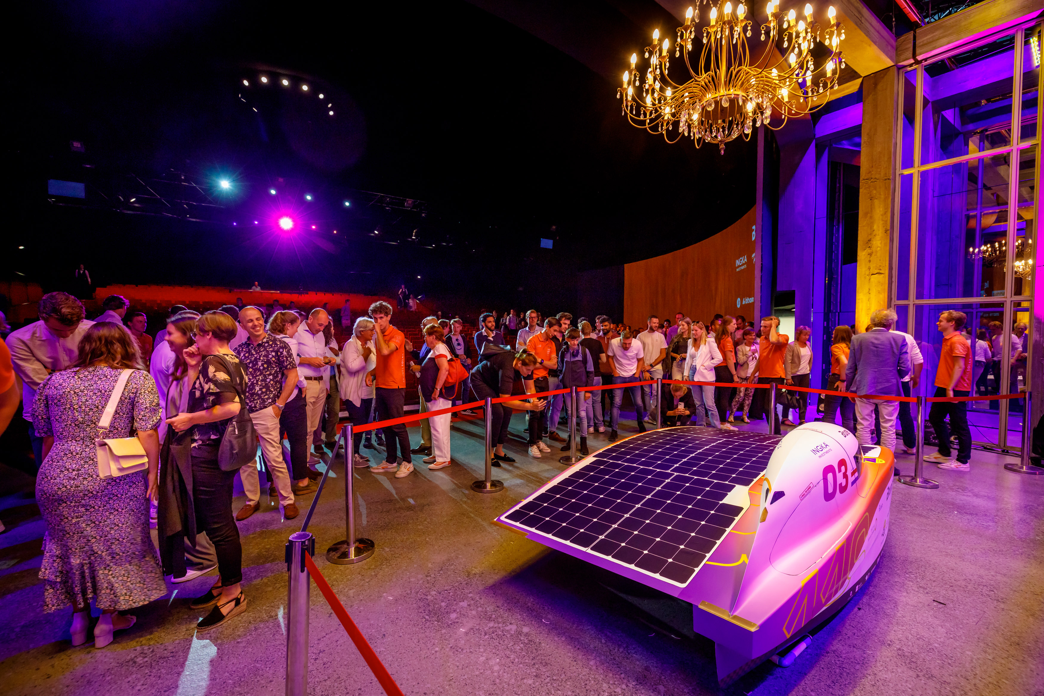 Nuna 11s at the podium of the carreveal with people watching