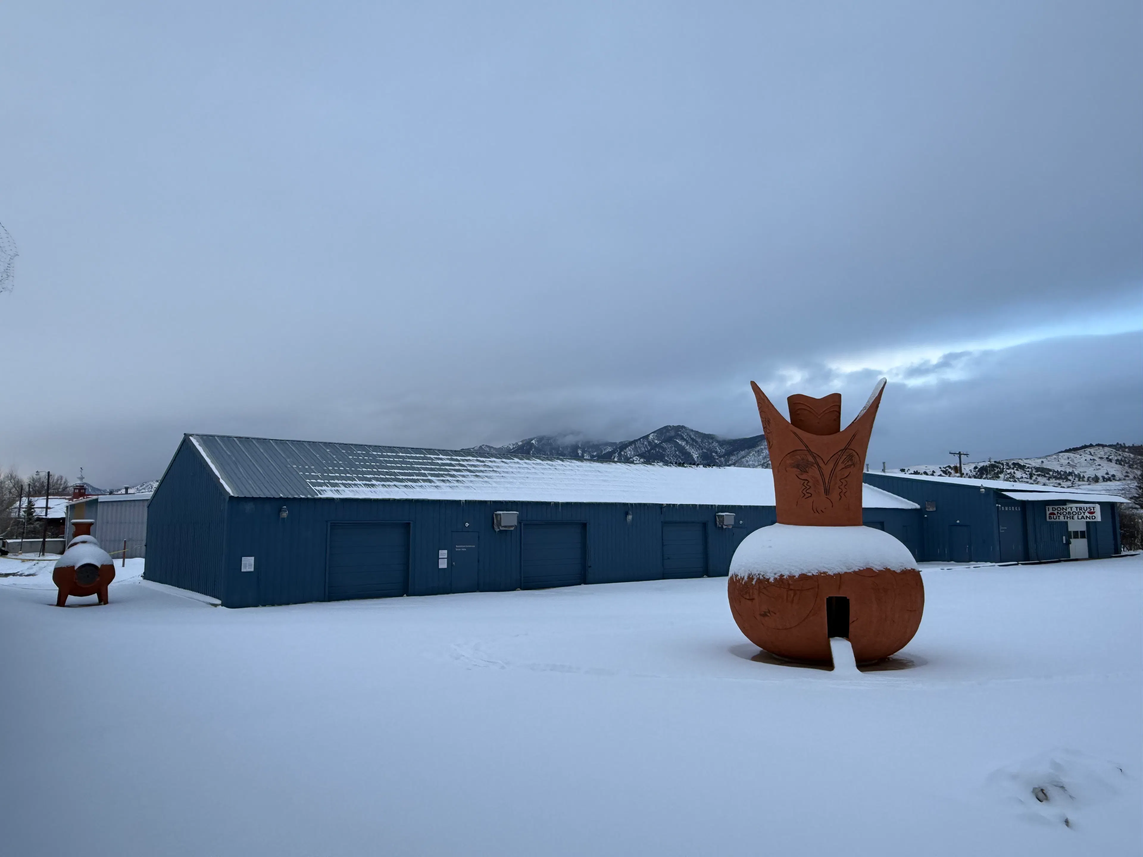 Tinworks Art with Gabriel Chaile sculpture in winter