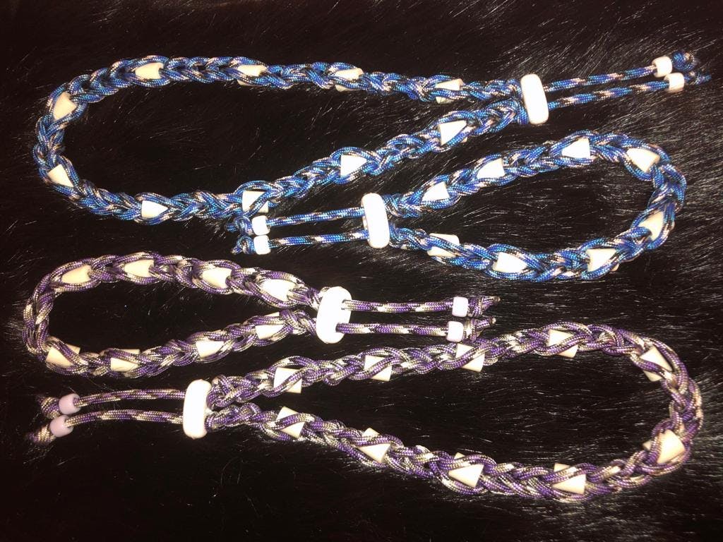 Three collars of blue and brown colours