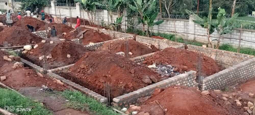 Workers at the library site working on the foundation