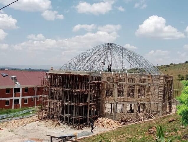Last of the roof trusses being placed in Sept 2021 on the auditorium.