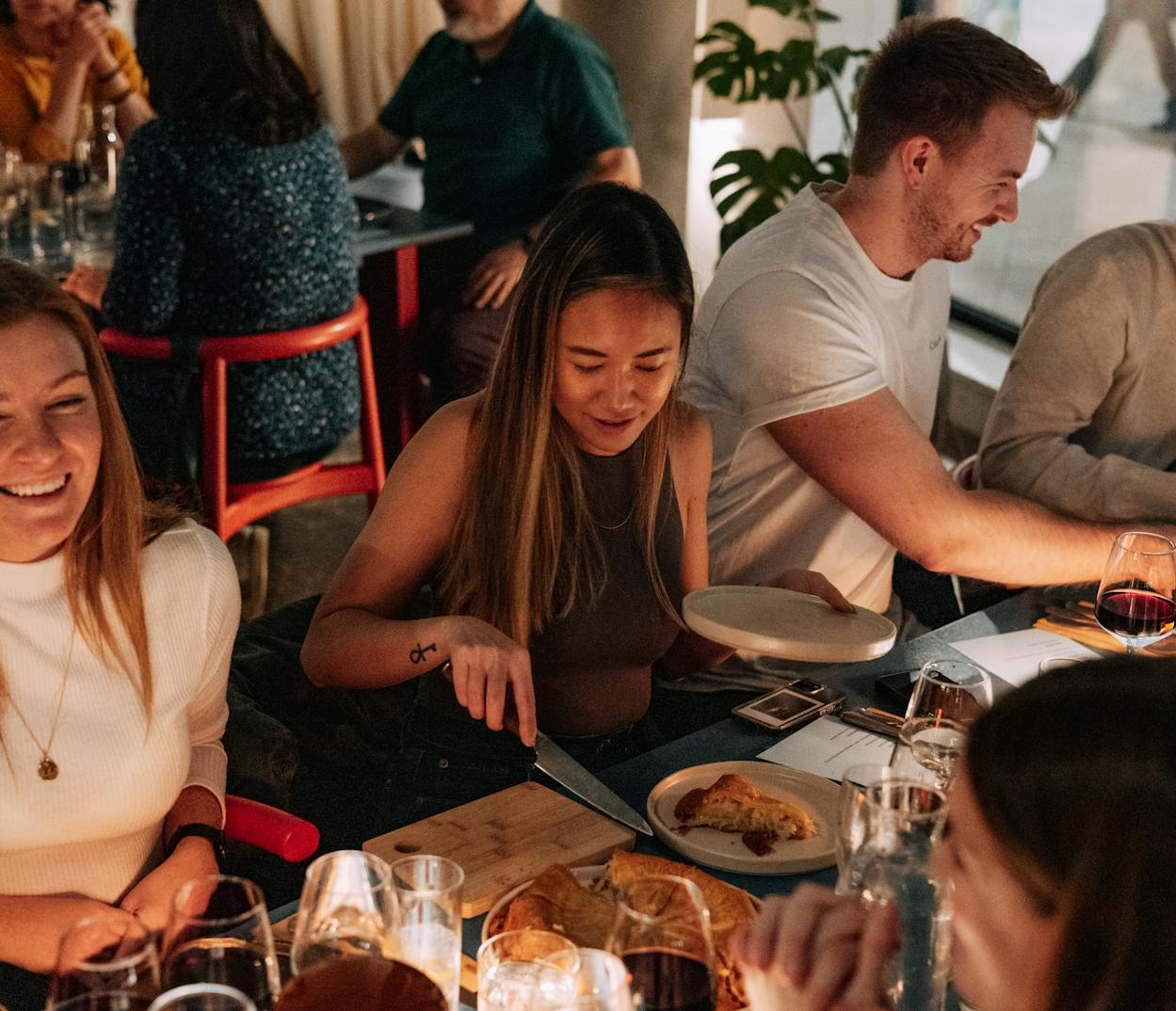 Diners at a festive event at Bureau Restaurant