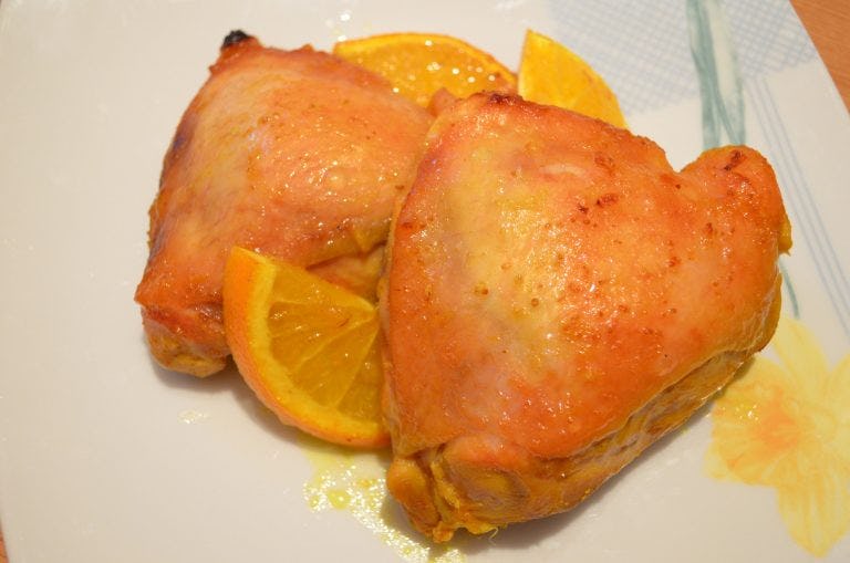 Курка, запечена з апельсинами