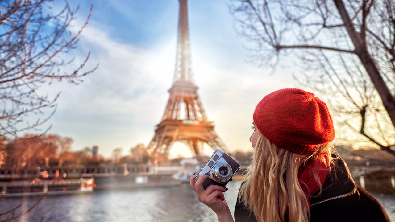 Woman taking photos in France 