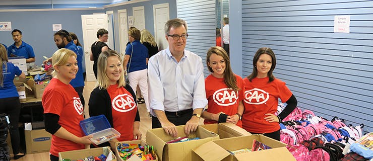 A picture of Mayor Jim Watson and CAA team members 