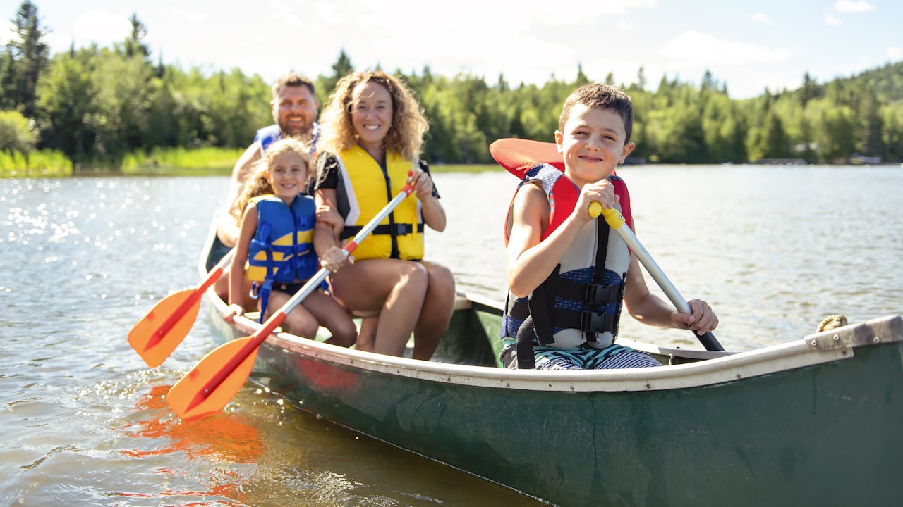 Family Canoeing on a lake