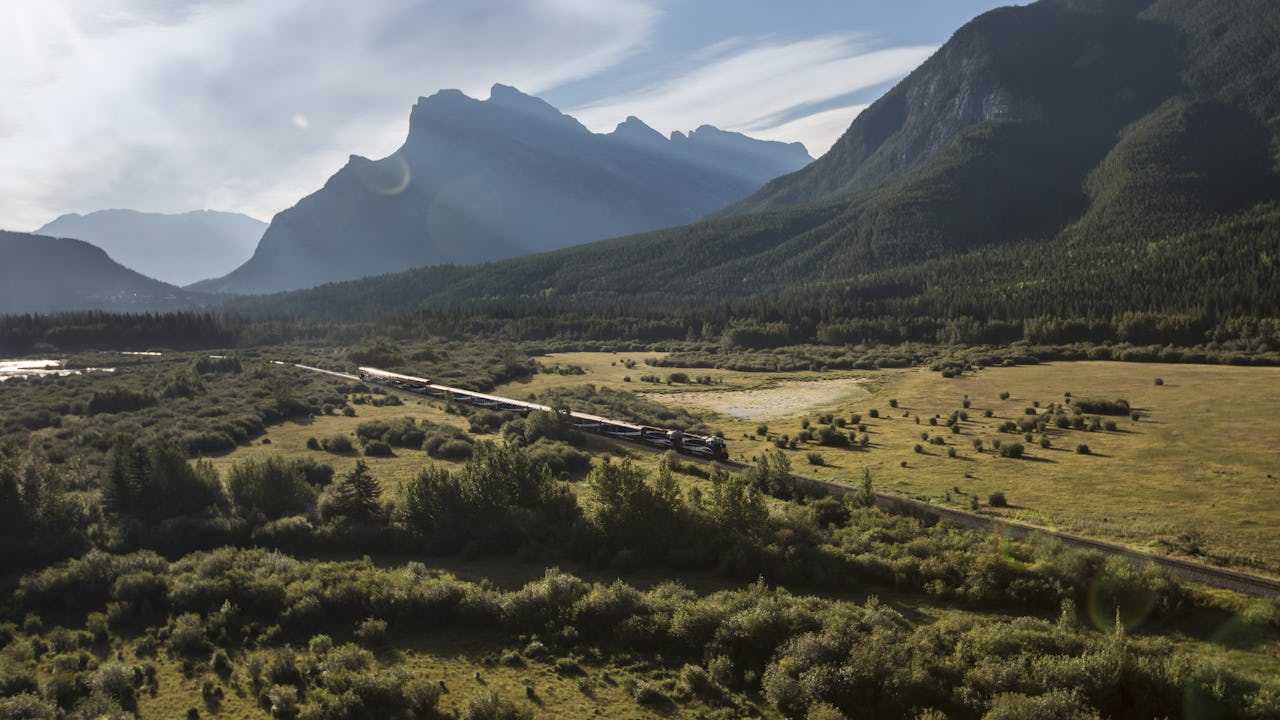 Rocky Mountaineer train gliding through the Canadian Rockies 