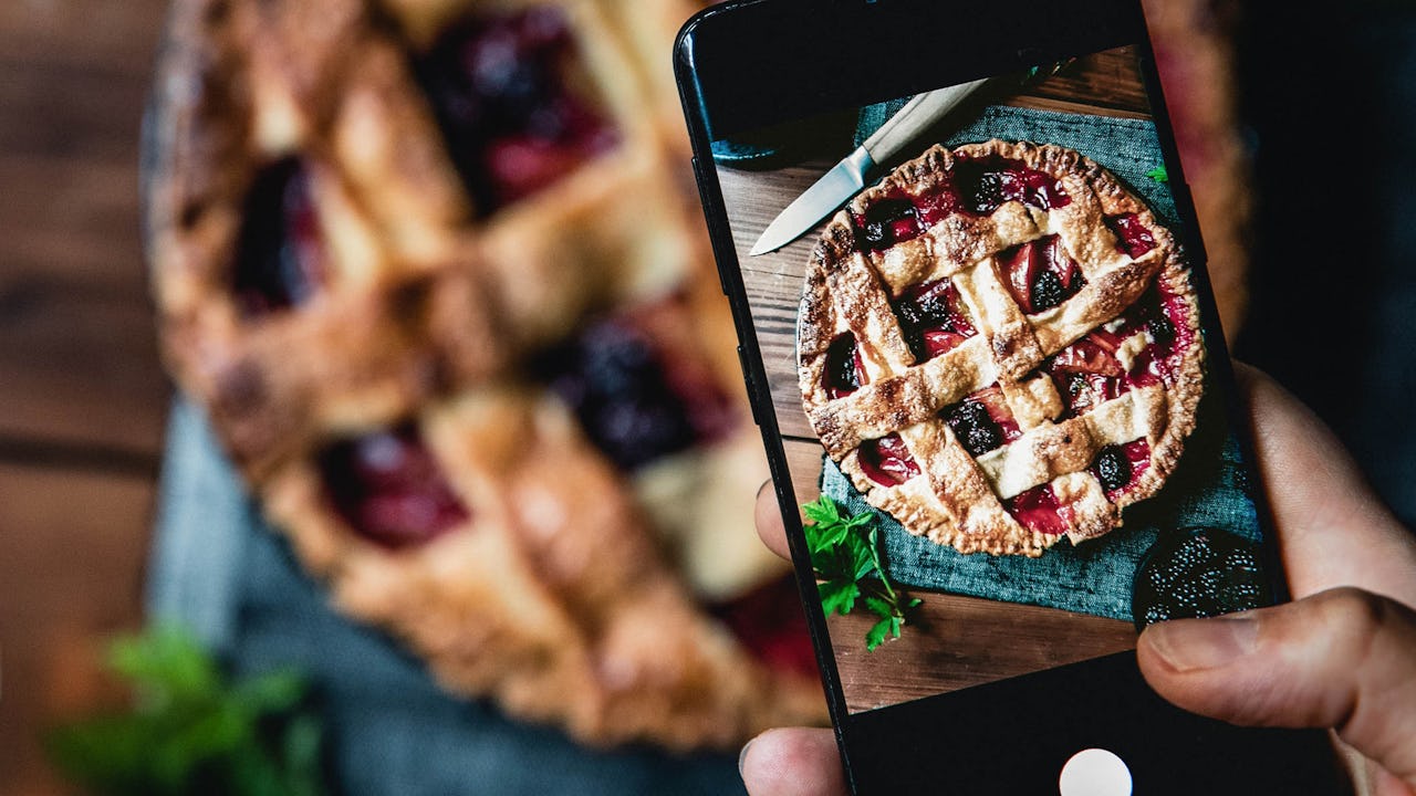 phone taking a picture of a pie