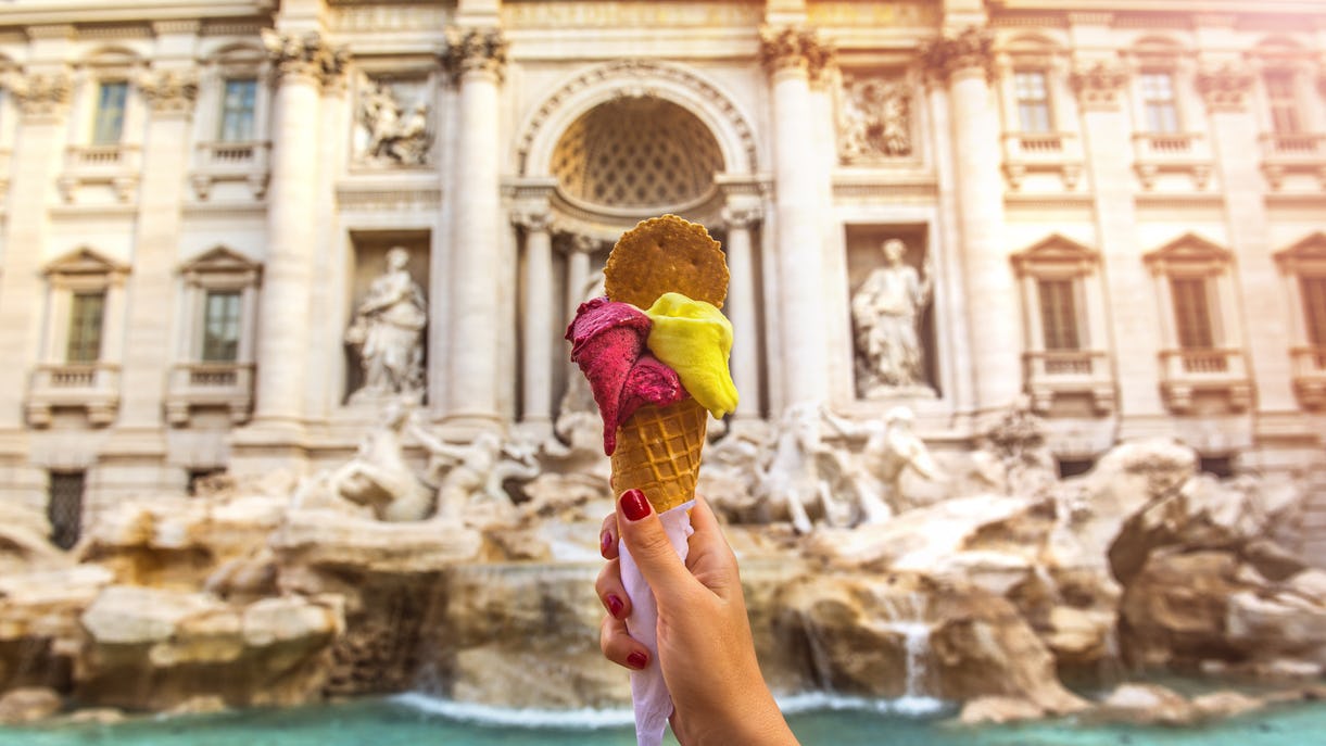 Holding an ice cream cone in Rome