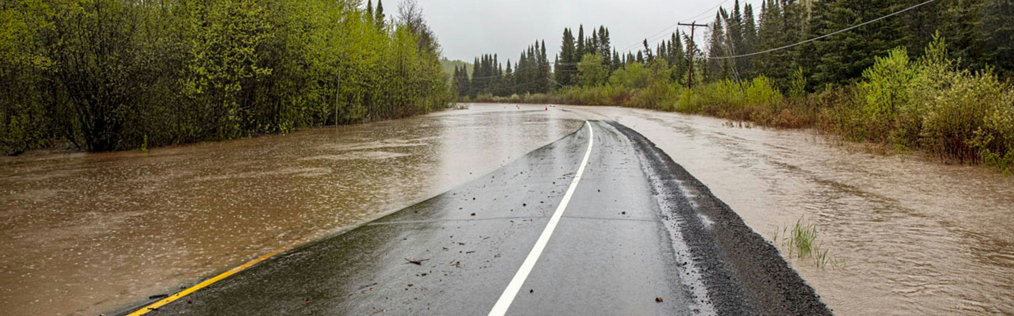 Road is flooded, always there for Emergency Roadside Assistance
