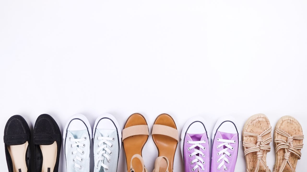 Multiple pairs of shoes in a row