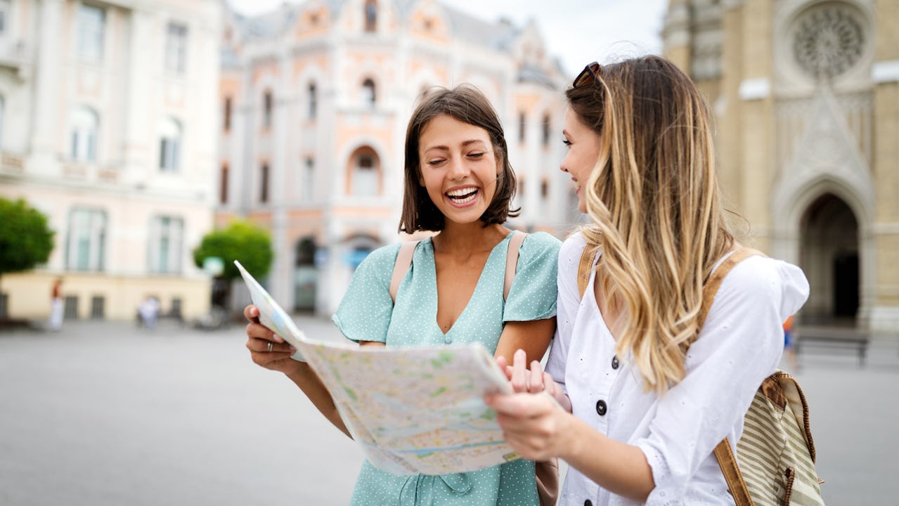 Two women looking at a map