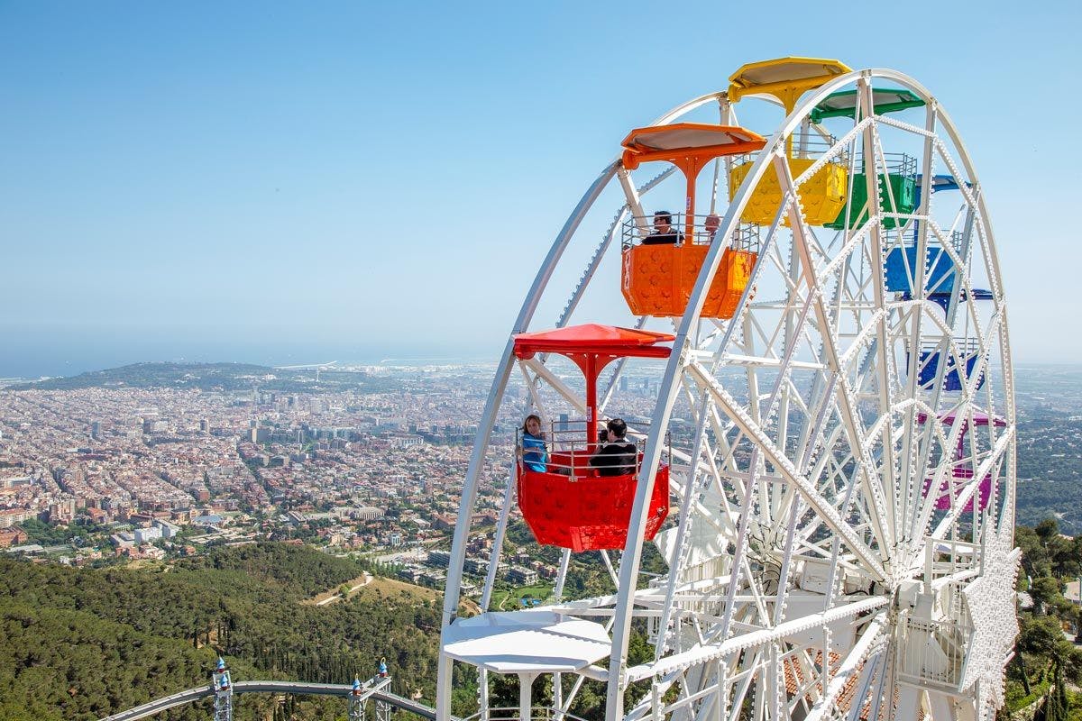 Tibidabo's theme park: A vibrant amusement park with thrilling rides, colorful attractions, and stunning views of Barcelona.