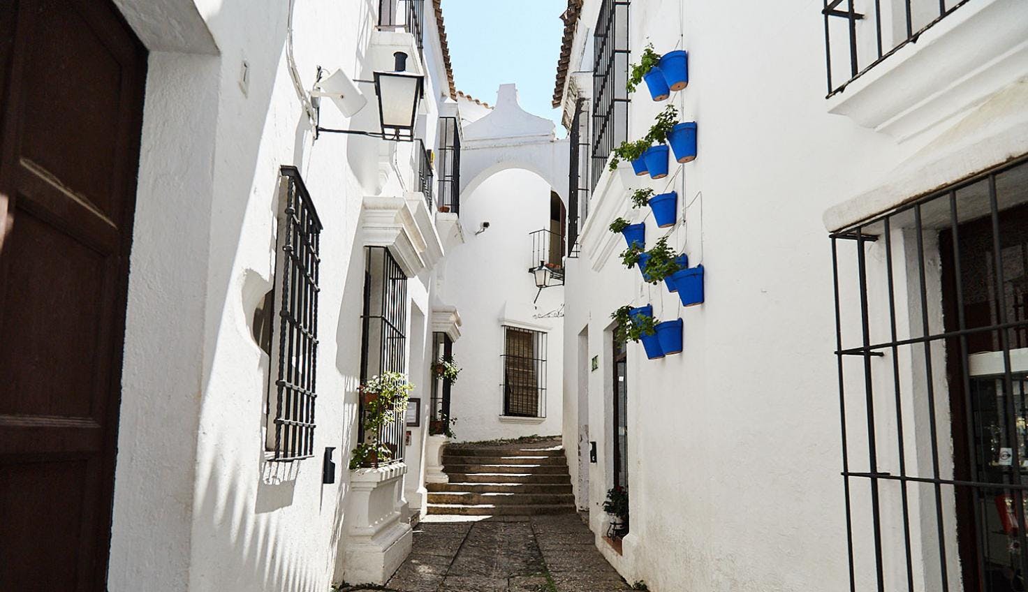 A Spanish village replica, called Poble Espanyol, showcasing diverse architectural styles. A cultural hub with shops, restaurants, and artisan workshops.