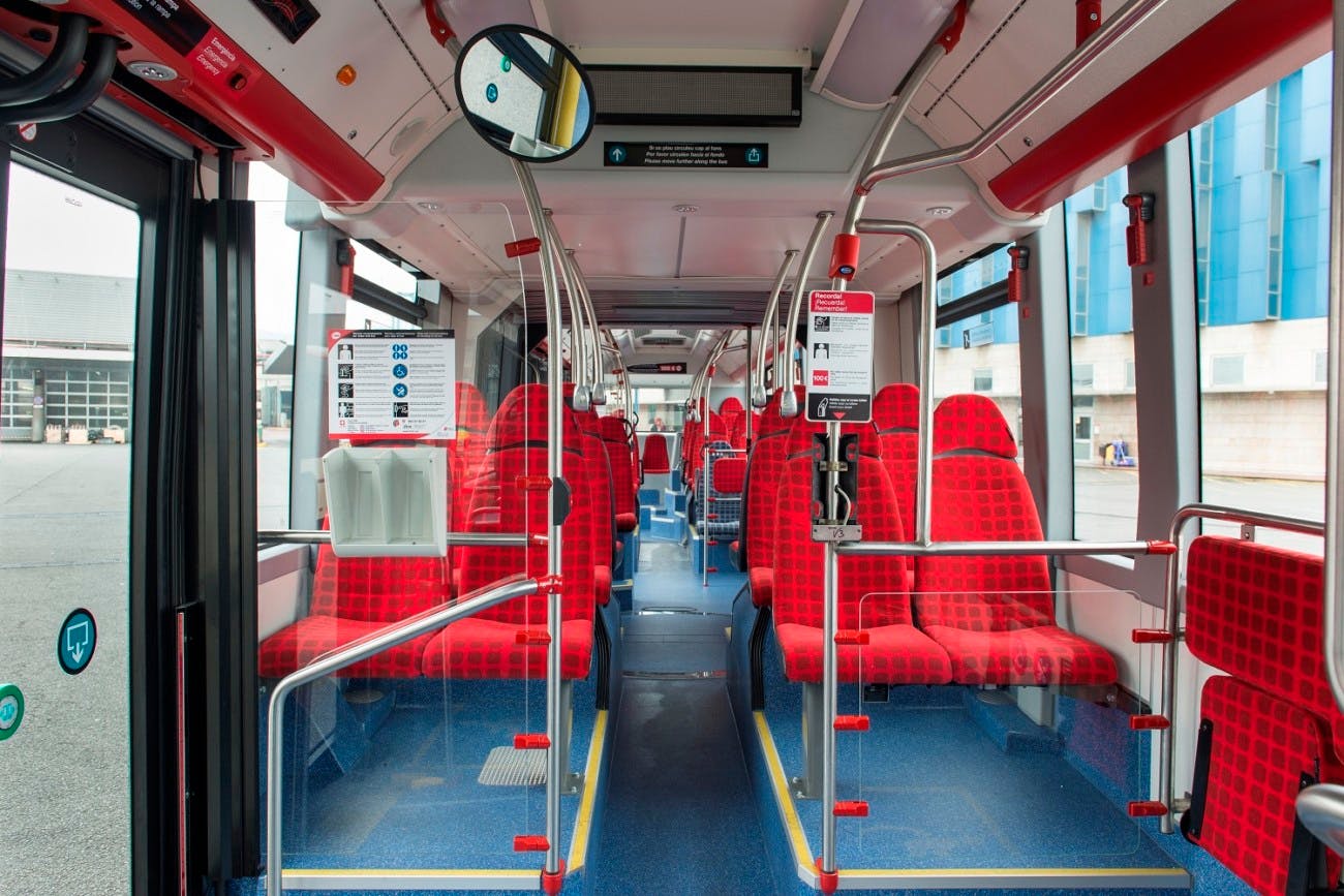 A red bus, symbol of public transport in Barcelona.