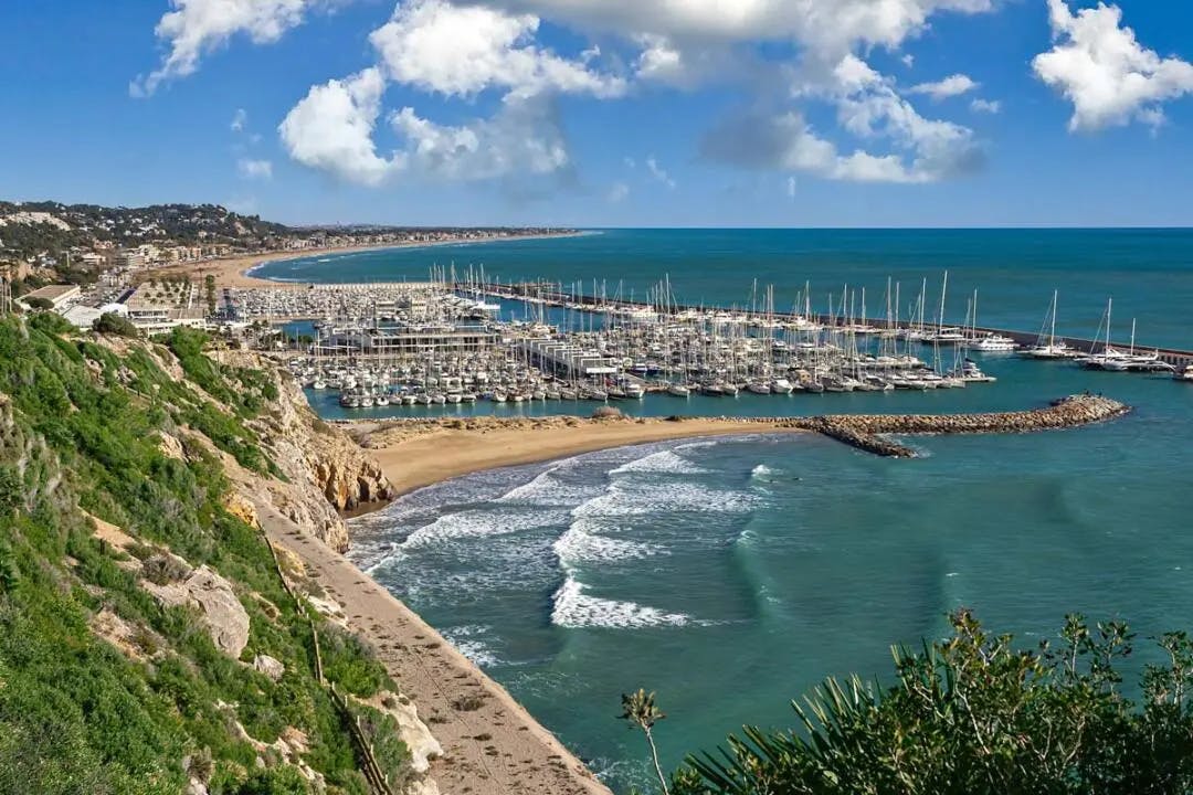 A scenic view of the marina in Castelldefels, Spain, showcasing the beauty of the coastal city.