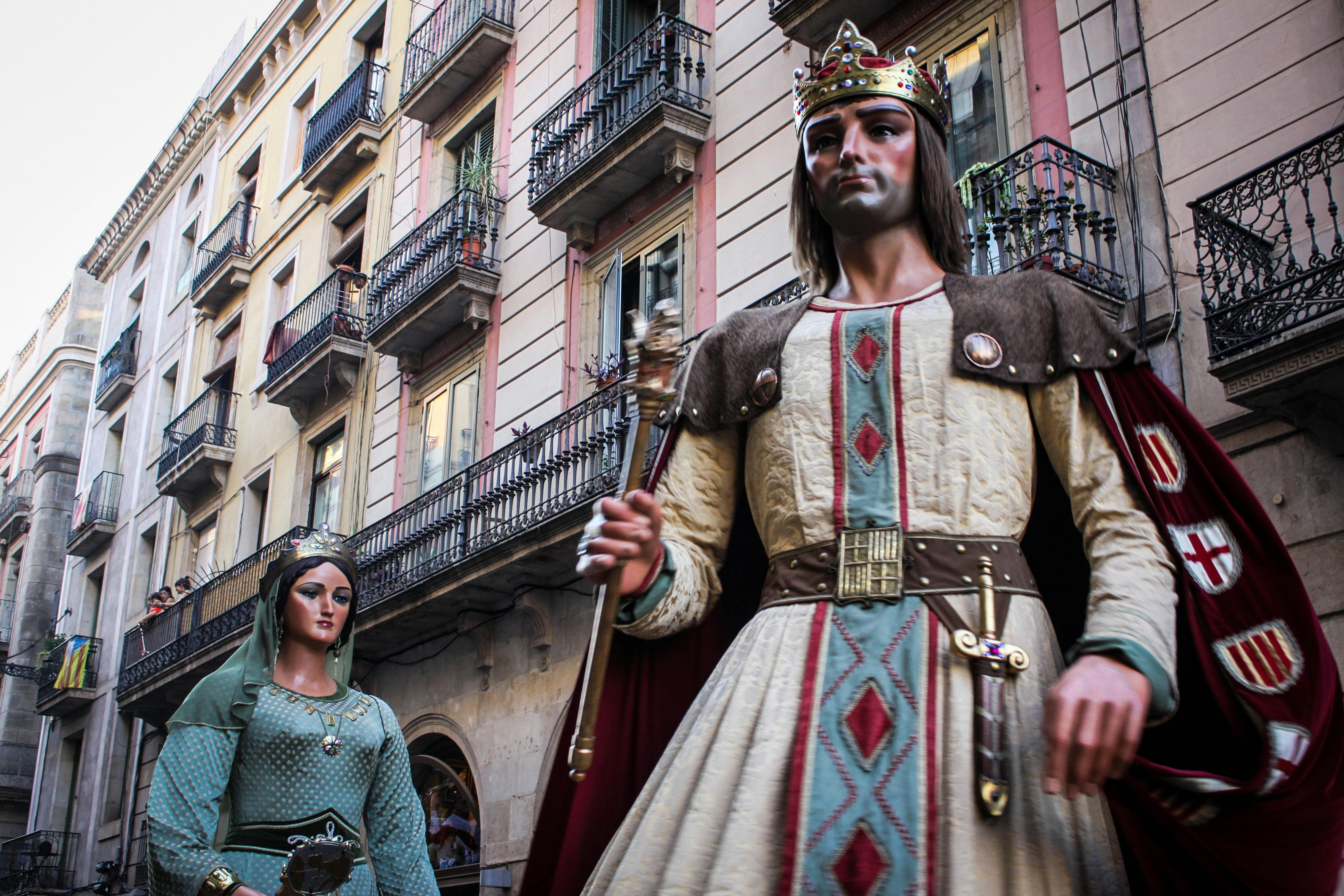 Statue of a king and woman at Festa de la Merce, Barcelona.