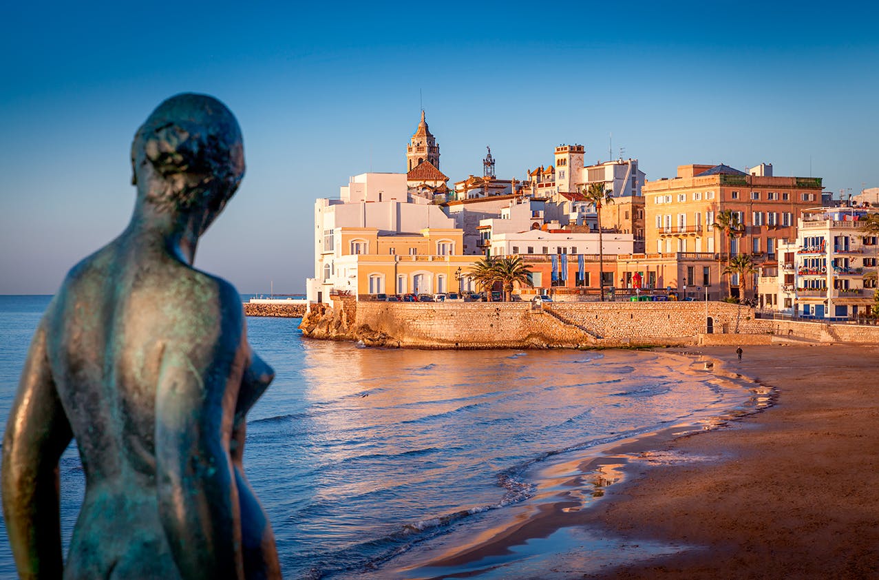 A statue of a woman in Sitges.