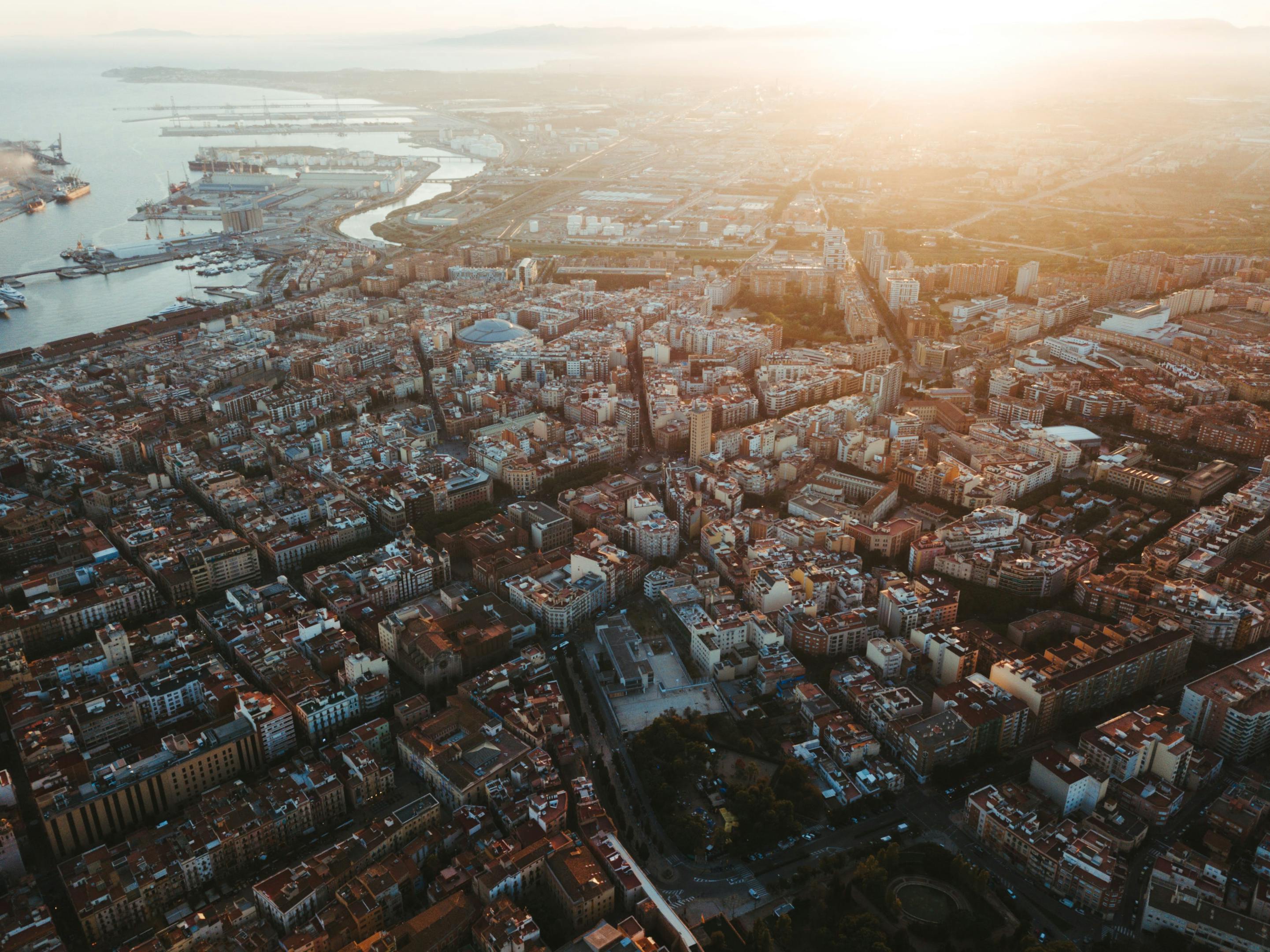 A captivating aerial shot of Tarragona city, highlighting the sea and the urban landscape.