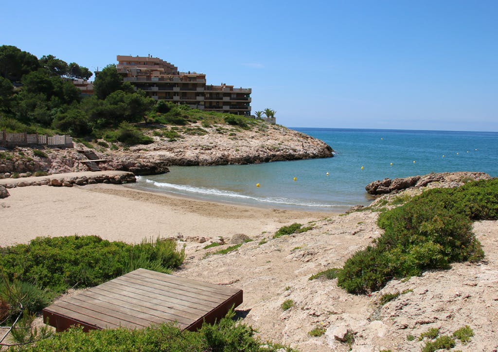 Cala Font's sandy beach, a tranquil paradise with soft sands and azure waters, perfect for a day of full relax.