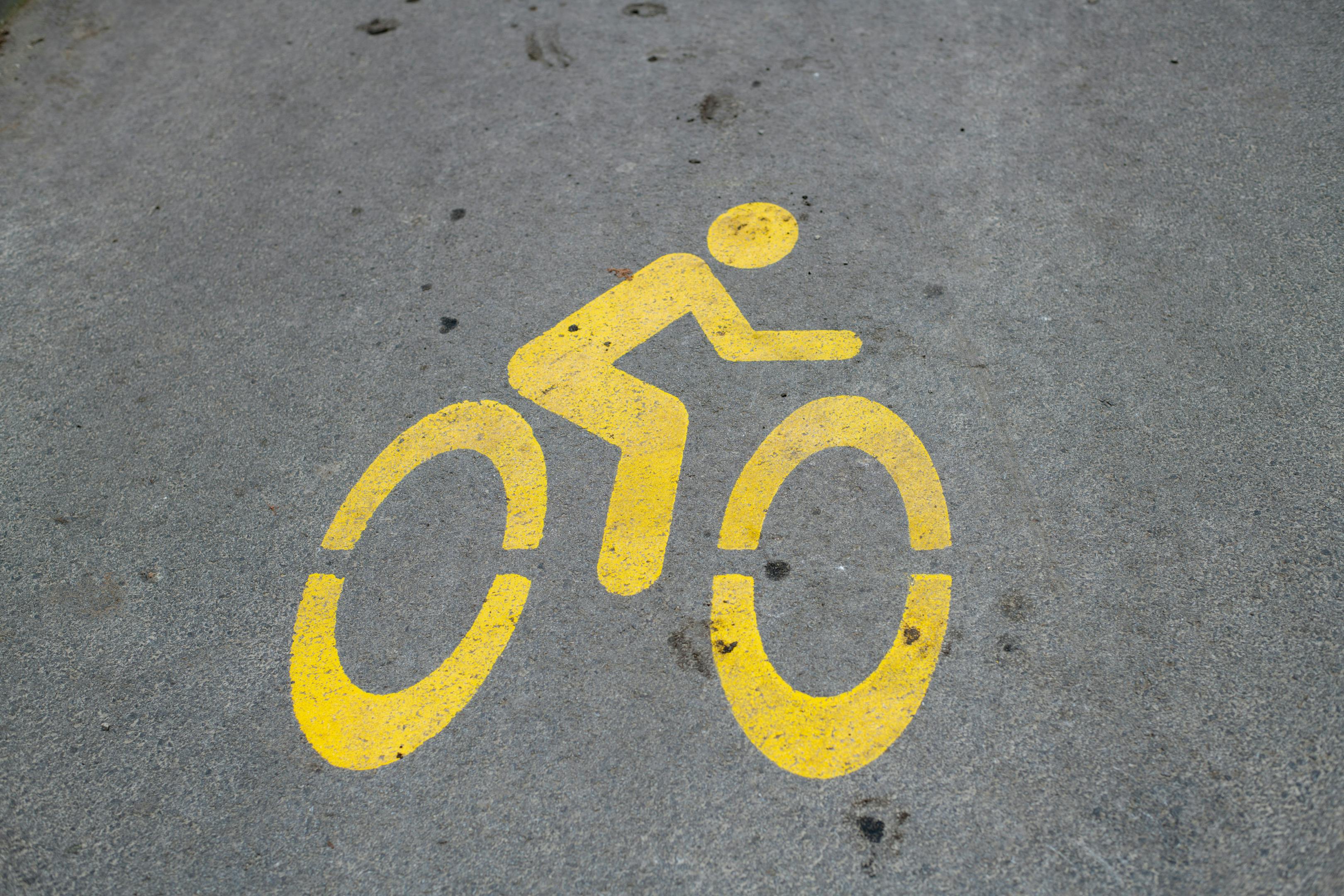 A vibrant yellow bicycle path, perfect for a leisurely ride or a quick commute.