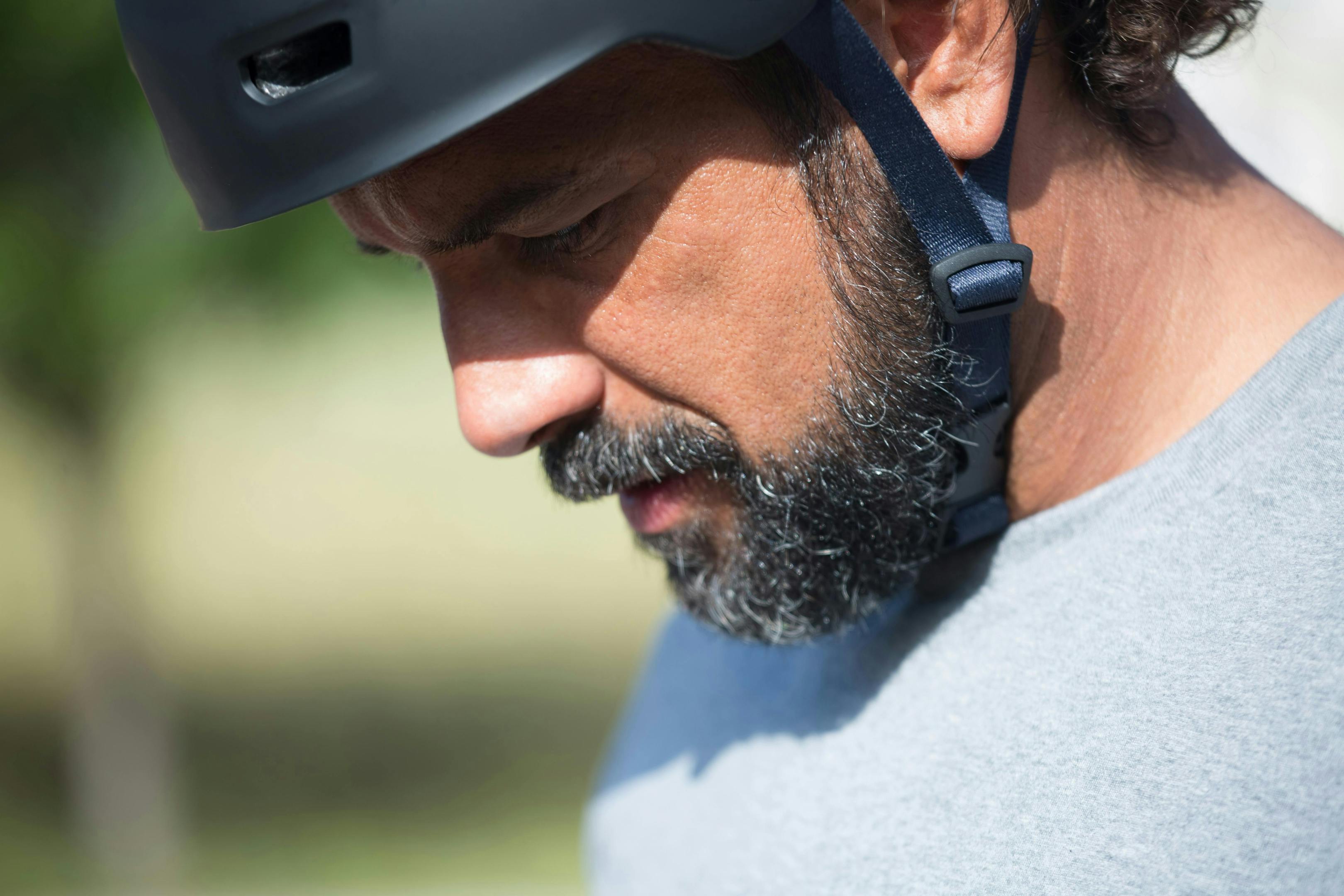 A bearded man wearing a helmet, ready for action.