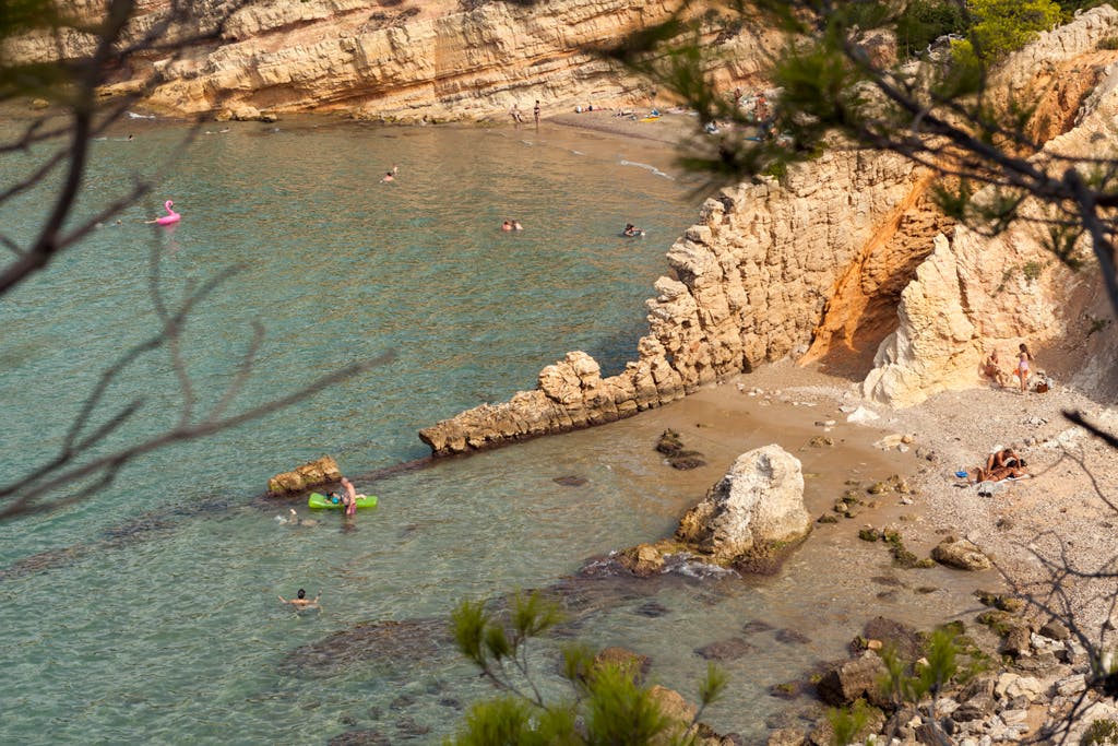 A serene view of Cap de Salou, showcasing a vast expanse of water, stretching as far as the eye can see.