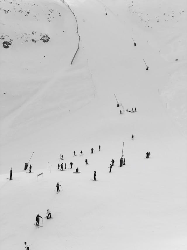 Snowboarders in a snow column in Andorra.