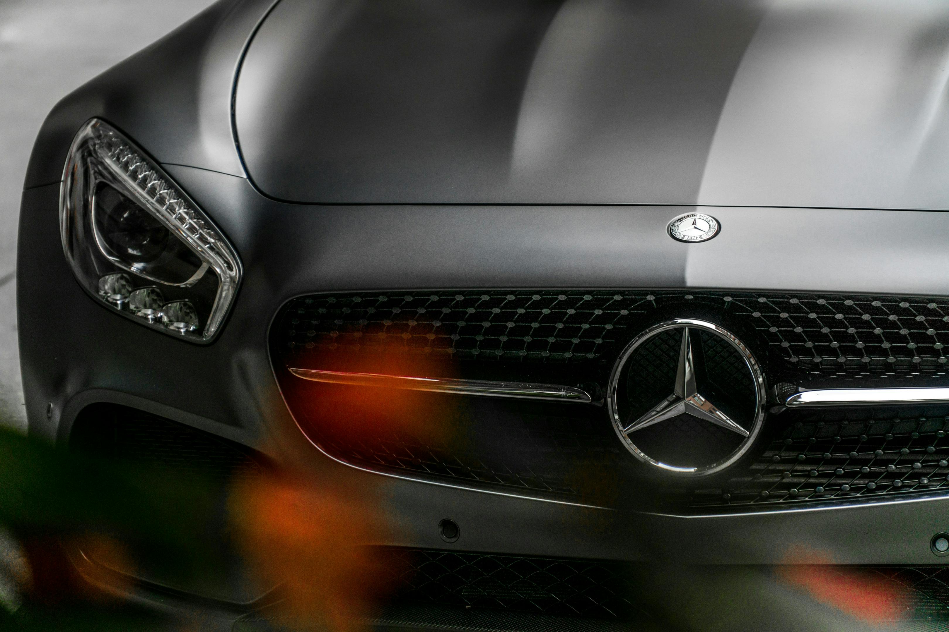 Front view of a sleek Mercedes Benz car.