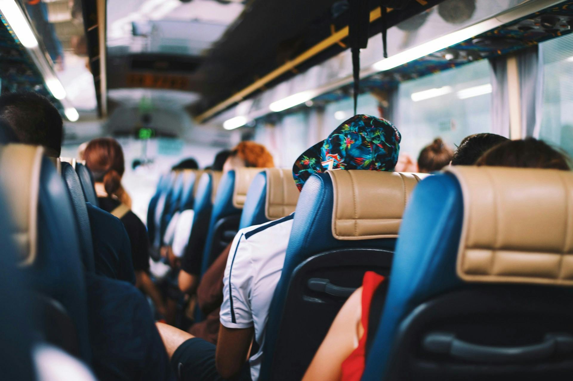 Passengers on a bus heading to Barcelona.