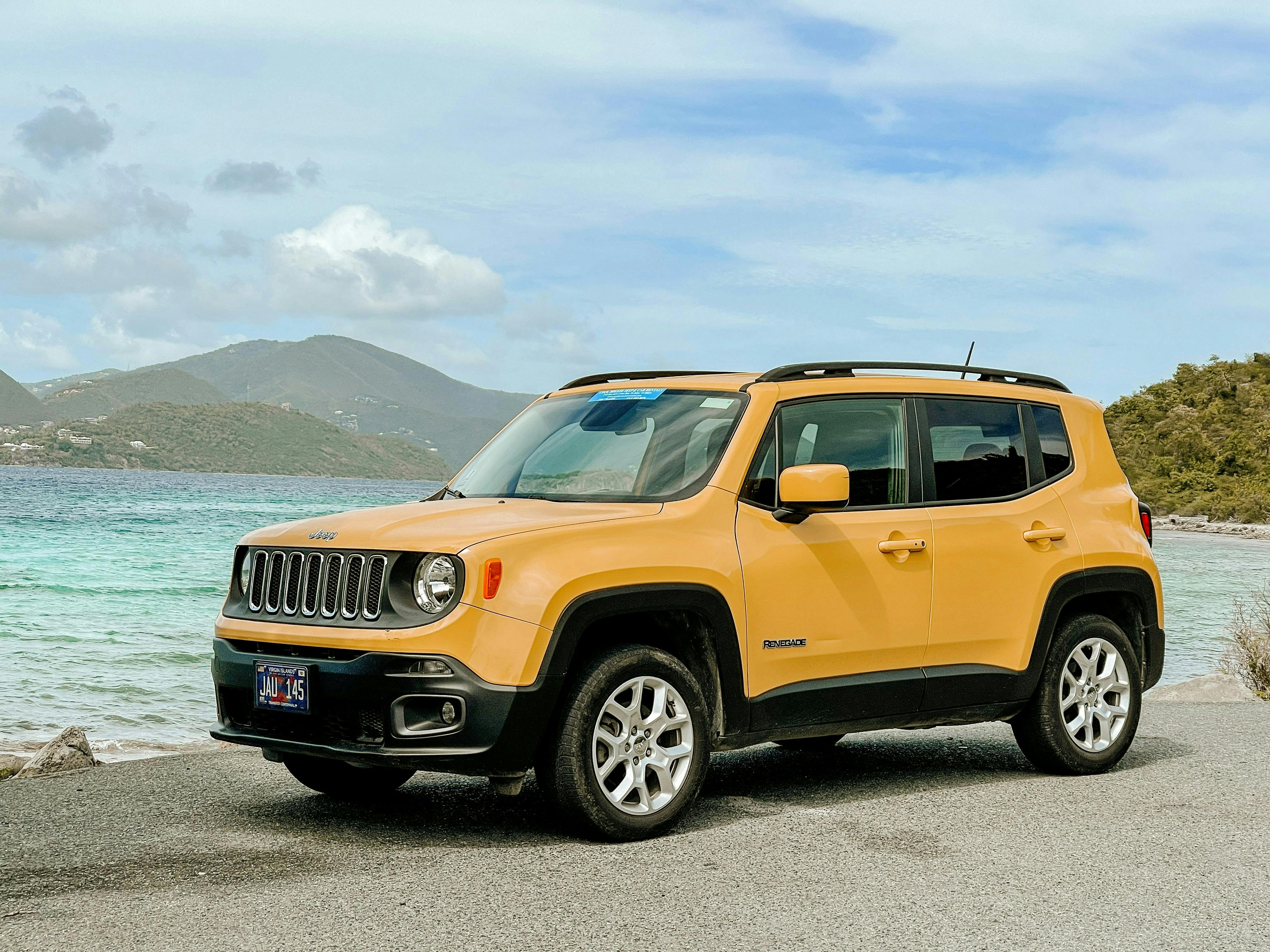 Yellow Jeep Renegade.