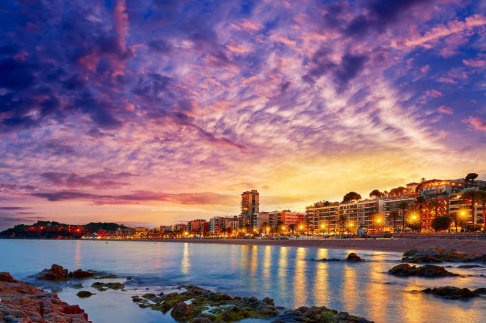 A beautiful sunset over the ocean with vibrant colors reflecting on the water.