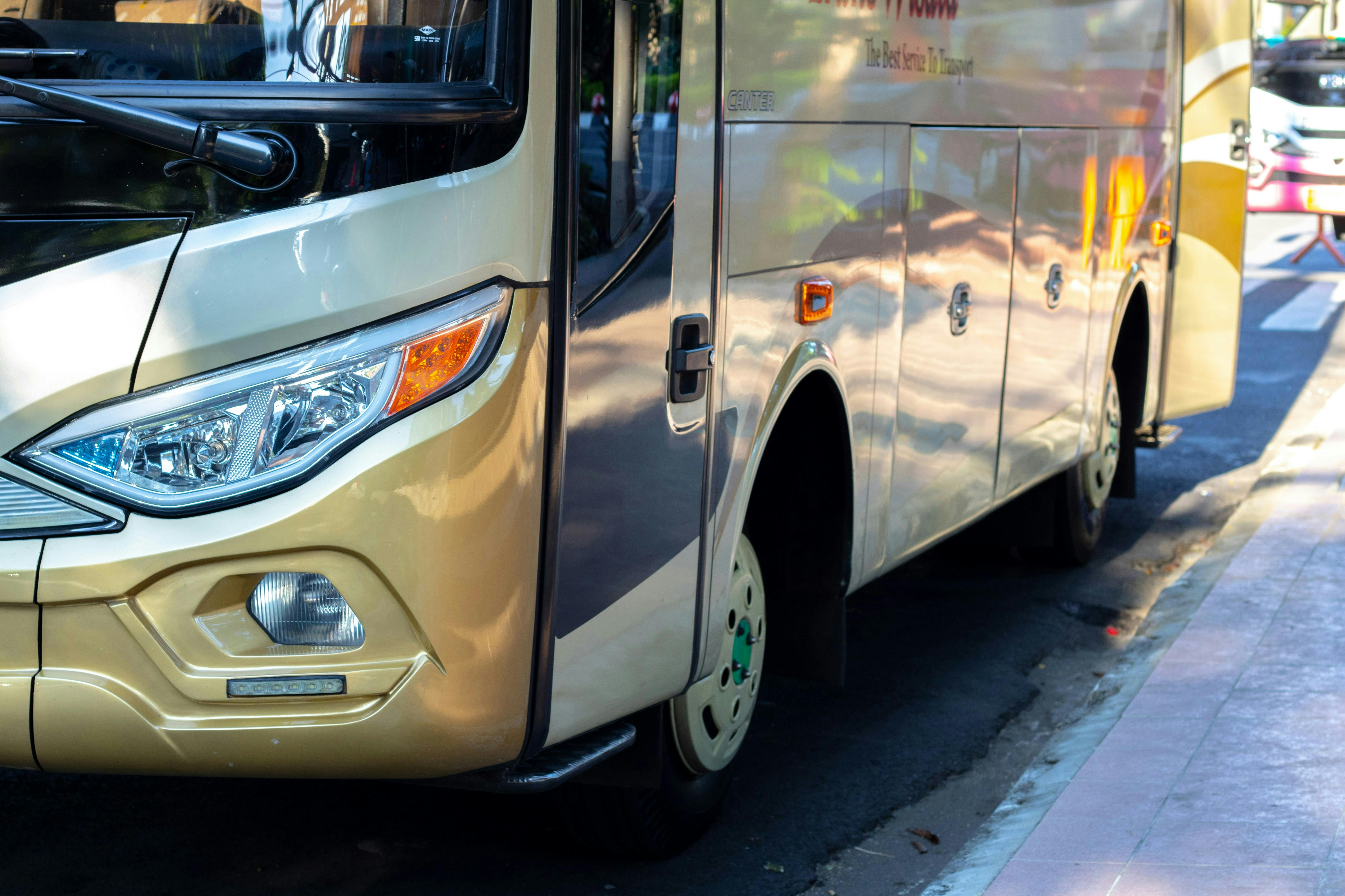 A parked bus, ready to depart.