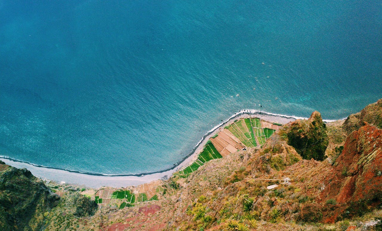 A coastal road with waves. 