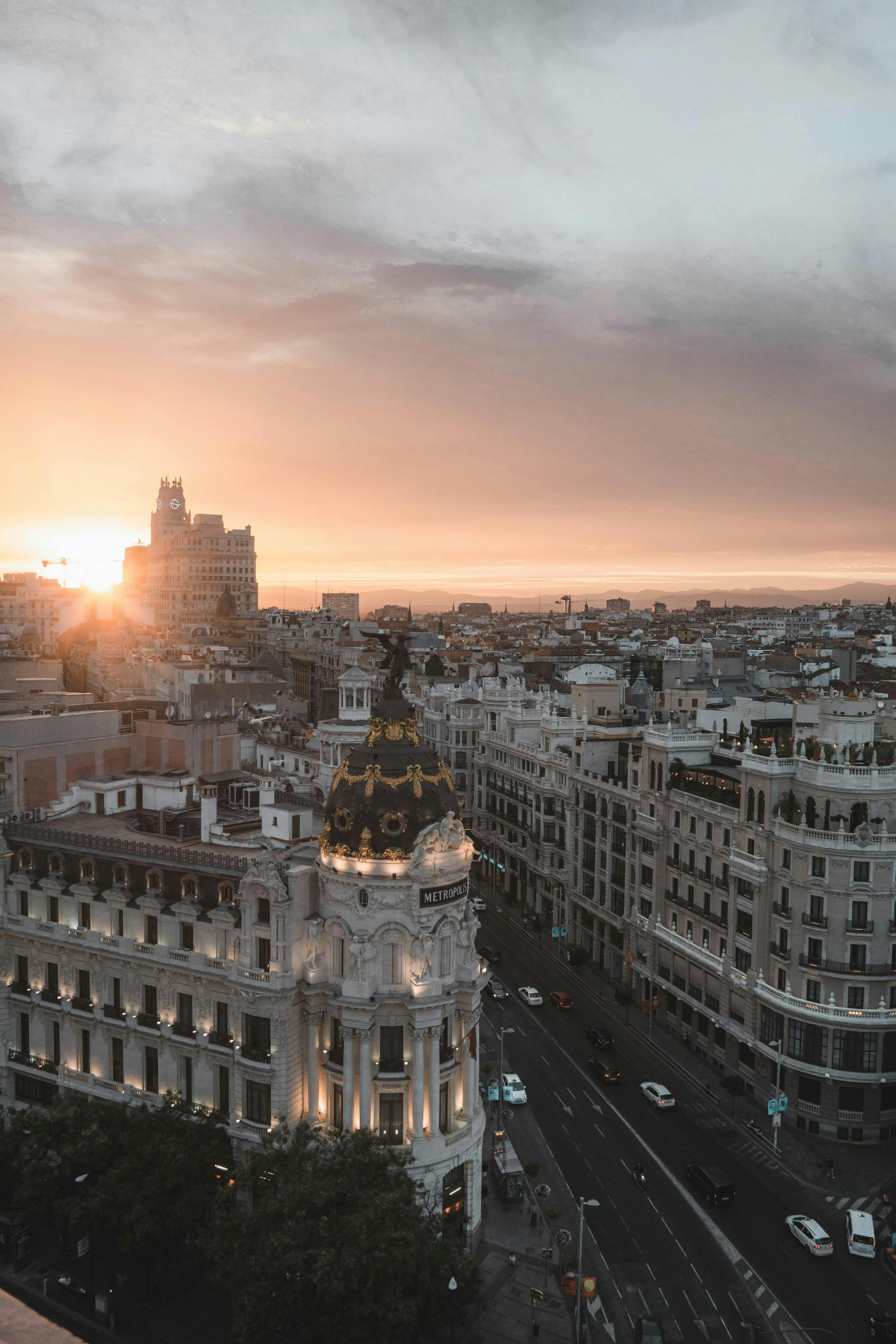 Sun setting over Madrid's skyline.