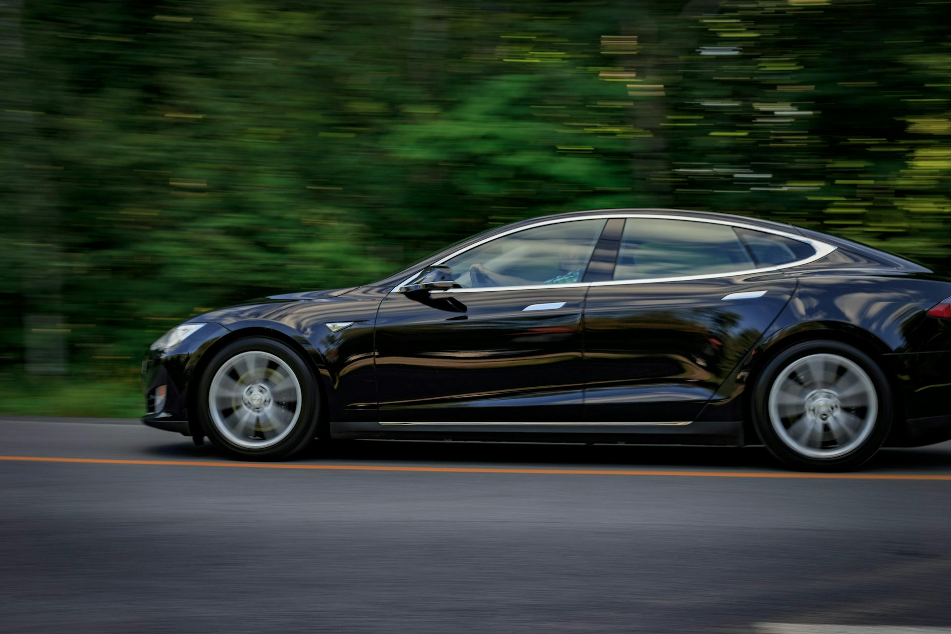 A sleek Tesla, showcasing its modern design and electric performance features.