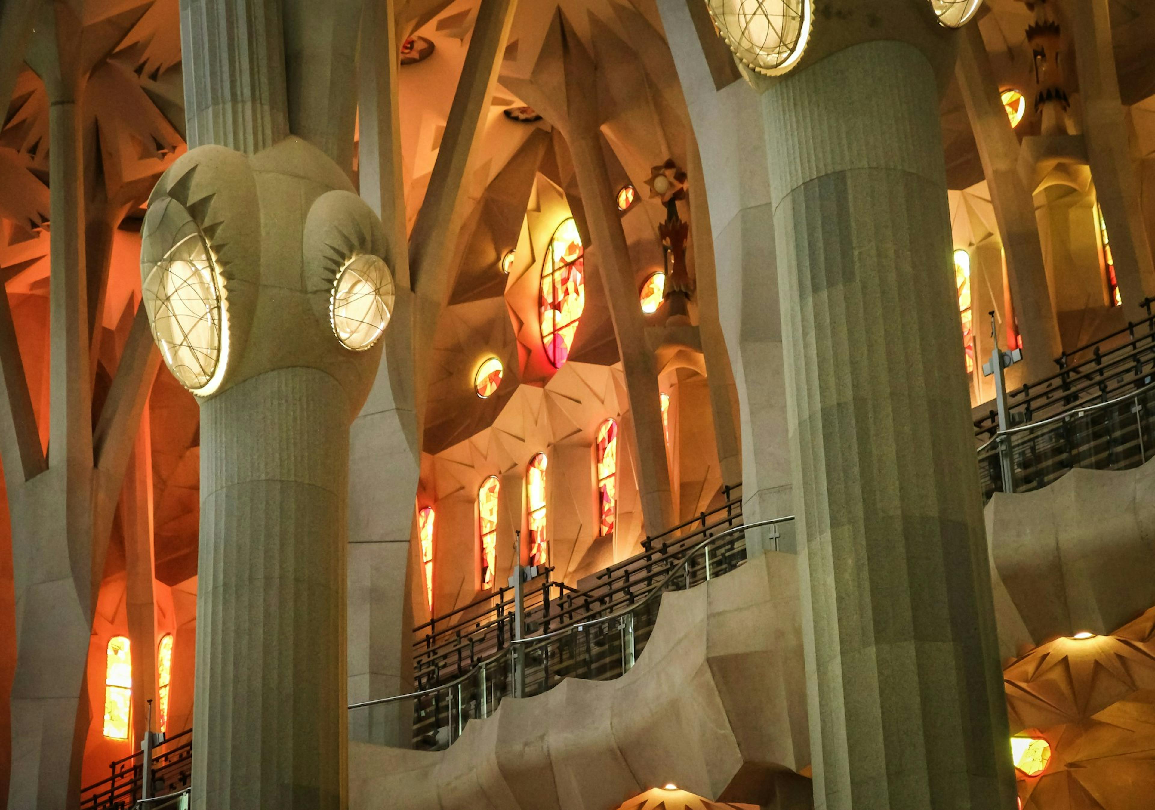 The intricate interior of Sagrada Familia, showcasing its stunning architecture and vibrant stained glass windows.