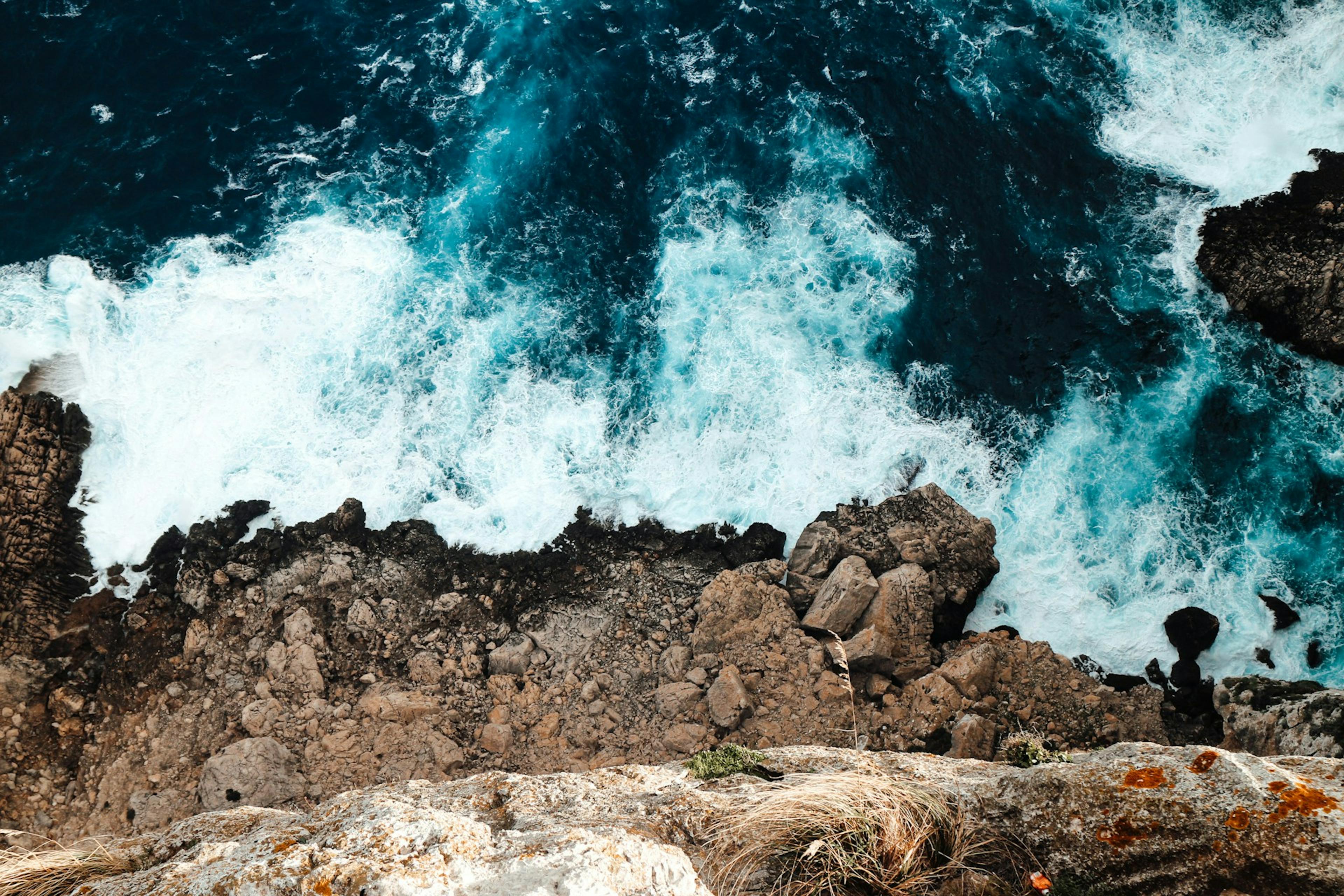 Aerial view of the ocean and rocky coastline near Palma de Mallorca.