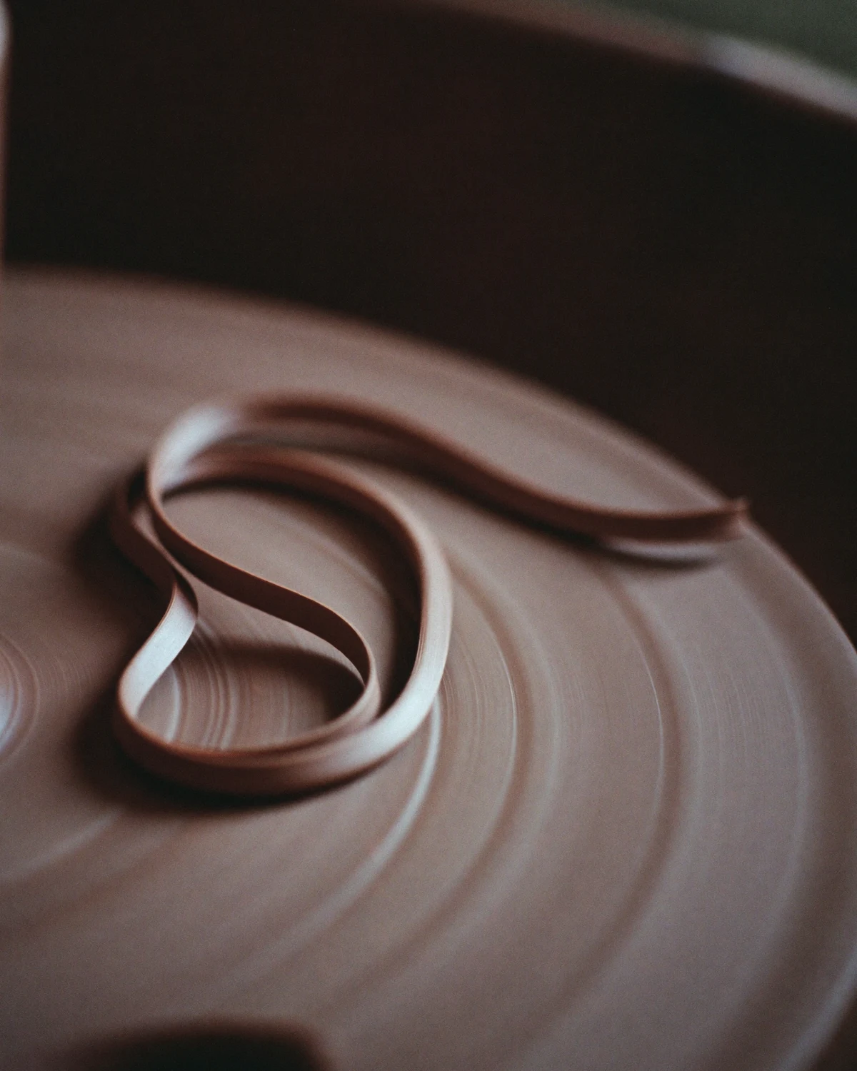Clay trimmings on a potter’s wheel