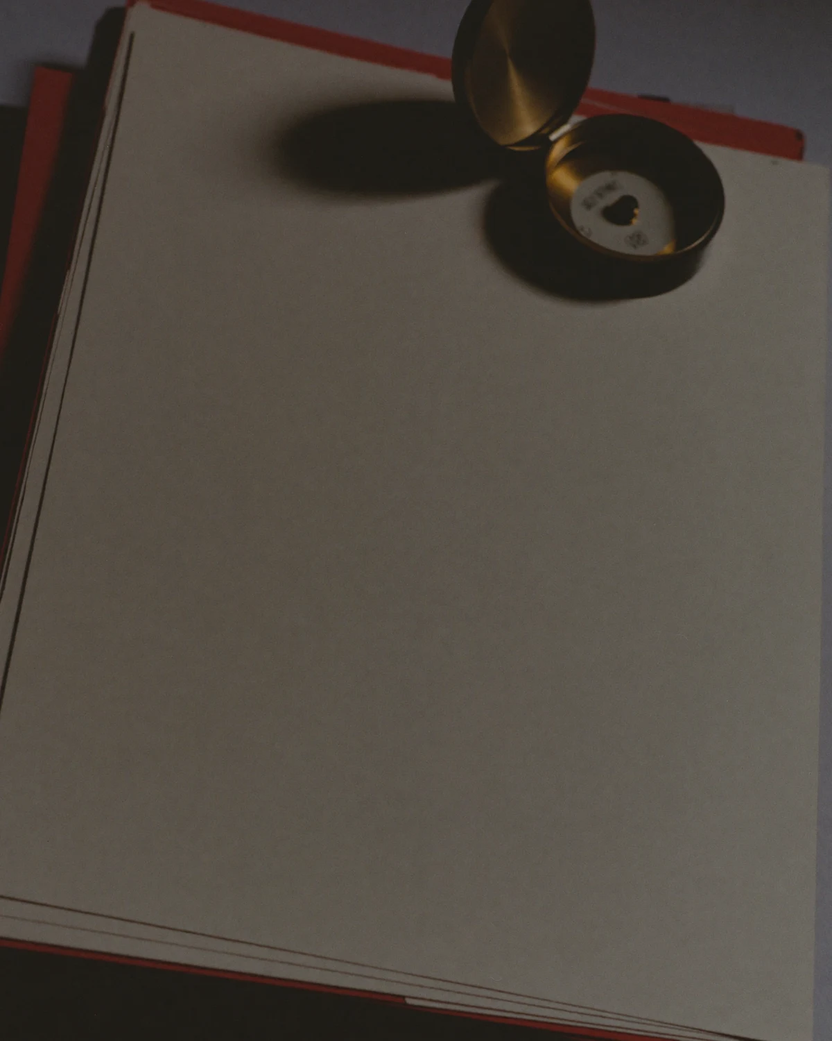 Paper stock and a brass compass