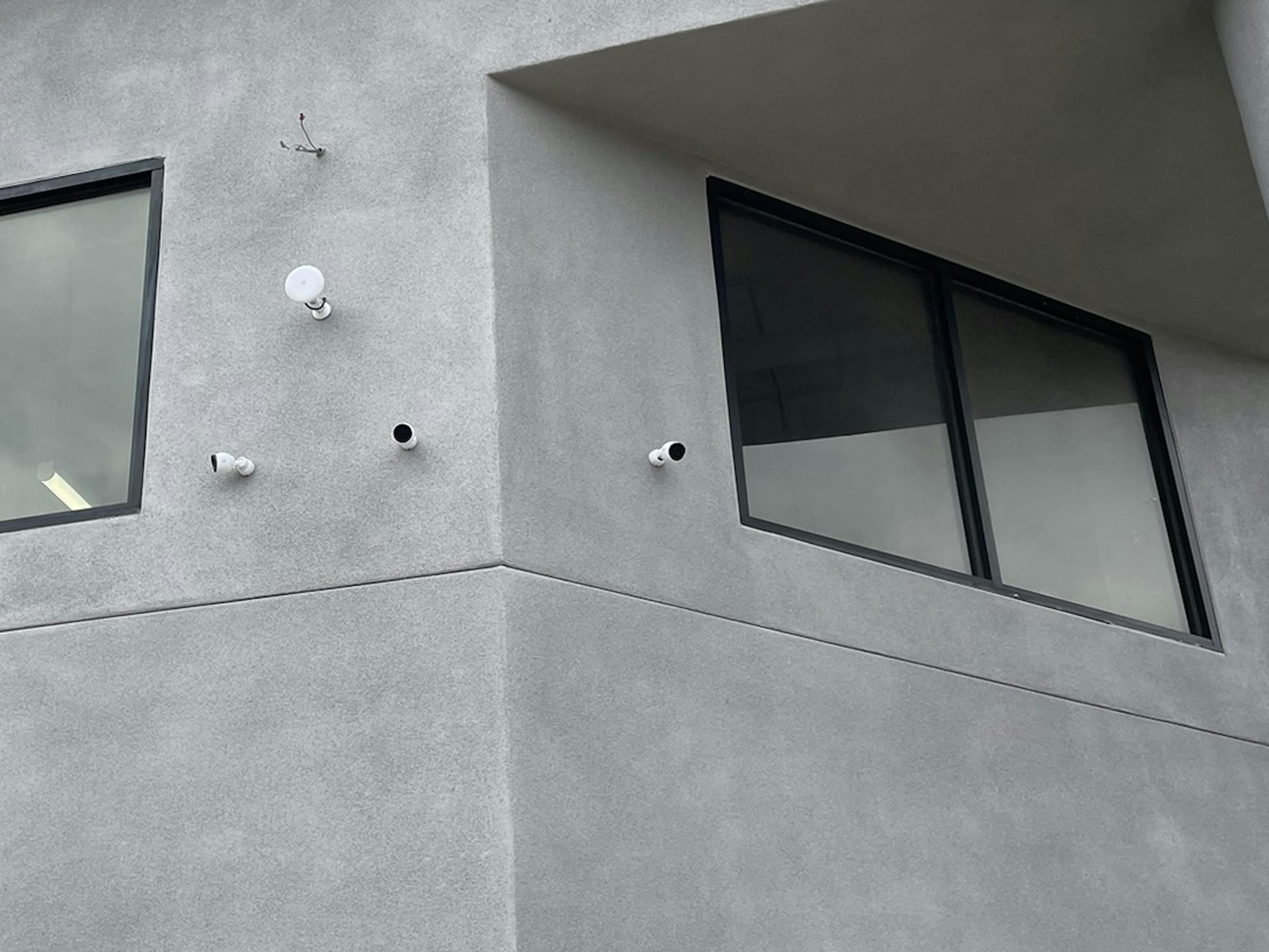 Security cameras installed on a building