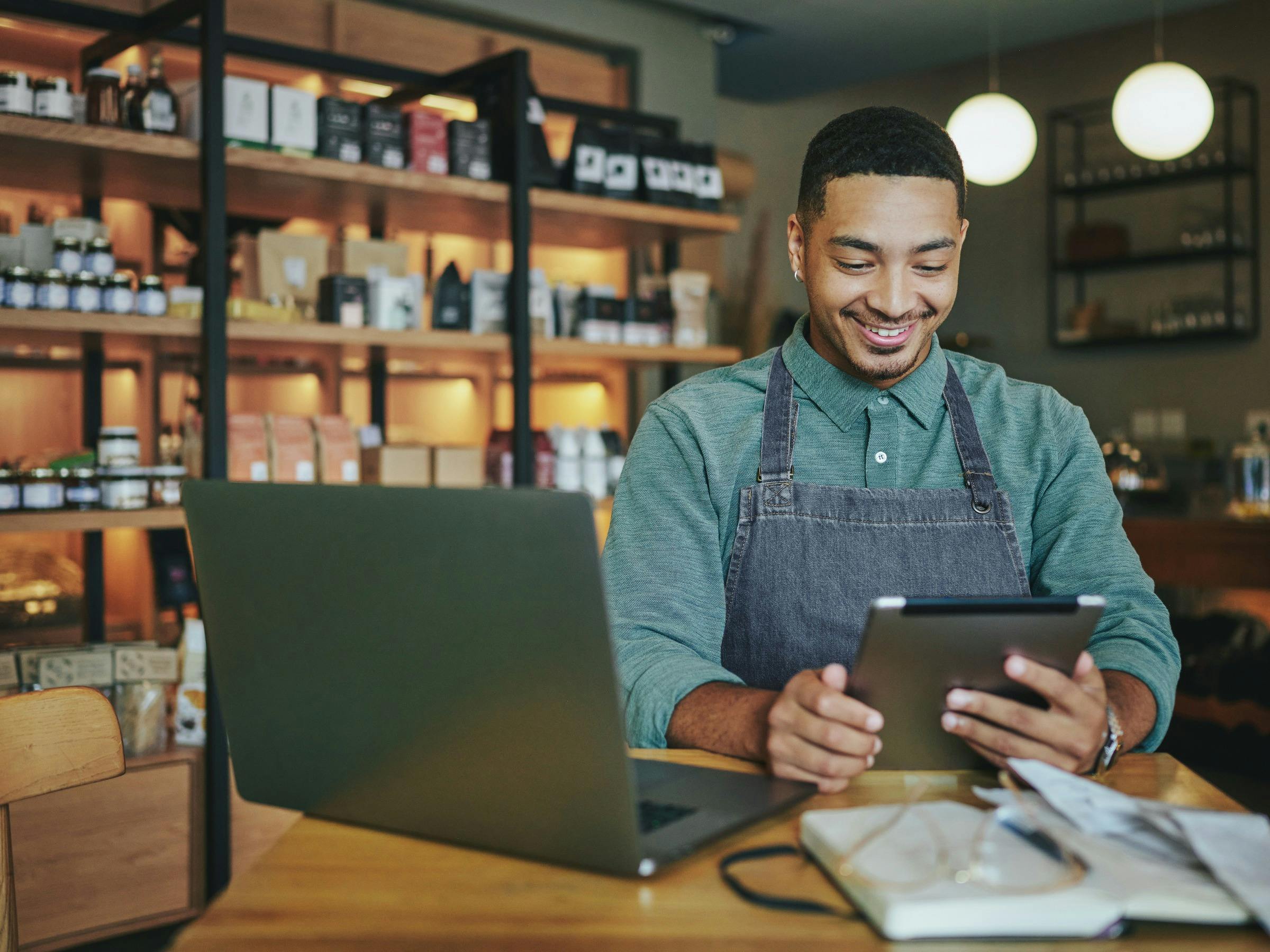 a small business worker with a computer and tablet