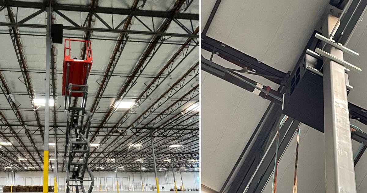 Two examples of warehouse data cabling are installed and hung securely.